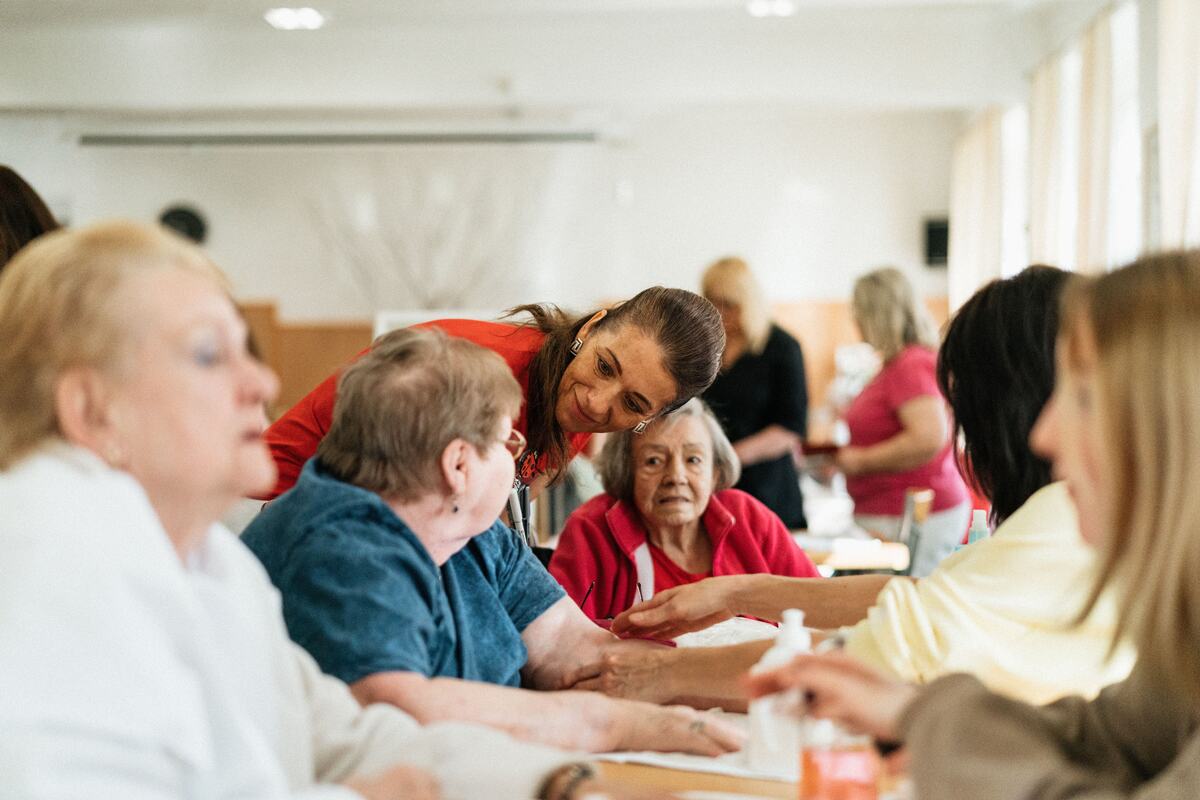 Residents and caregivers at a care home